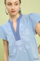 Umgee Abstract Applique Split Neck Top in Light Blue